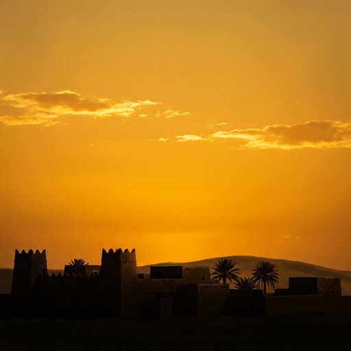 The same horizon in the afternoon, the whole sky gone gold.